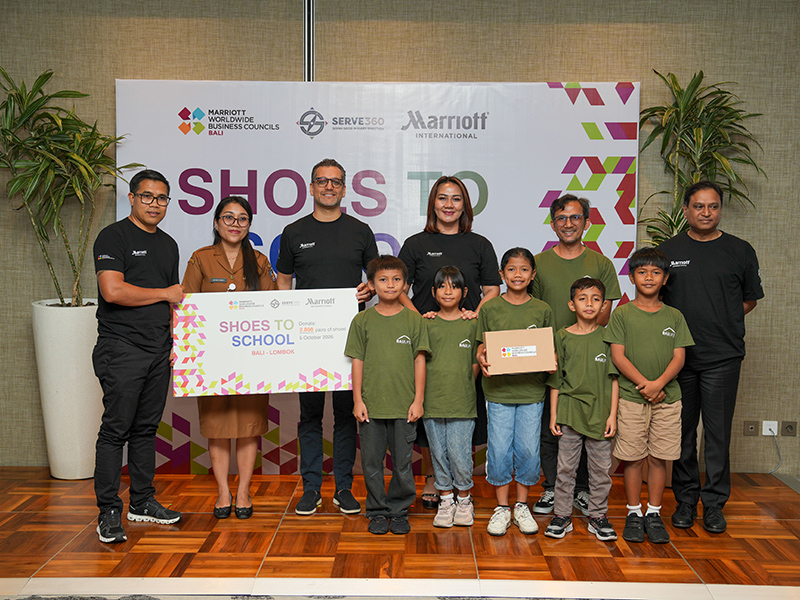 Handover ceremony shoes to school with children
